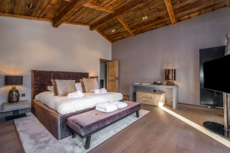 Photographe chalet à Megève : Master bedroom d'un chalet de luxe