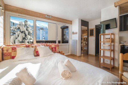 Canapé convertible en lit dans un appartement dans la résidence Olympic, Val Thorens
